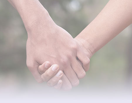 Two hands holding each other representing sexuality nursing CEUs