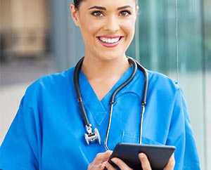 Delighted nurse takes notes from the provided list.