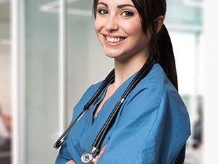 A nurse looking questioningly at the camera