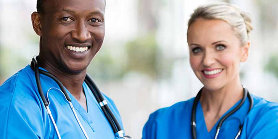 Two nurses discussing out available renewal bundles