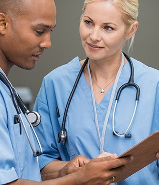 Nurses checking their renewal fees.