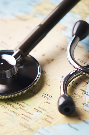 Stethoscope on a travel map