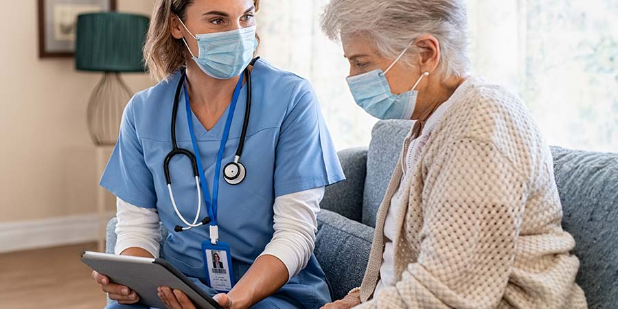 Nurse educating a patient on stroke recovery