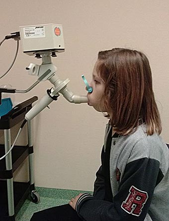 Spirometry testing device used in diagnosing and monitoring asthma