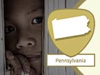 Young abused male child looking through open window and Pennsylvania state outline