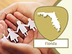 Woman's head with blond ponytail clutching her hands on her neck for stress from domestic violence and Florida state outline