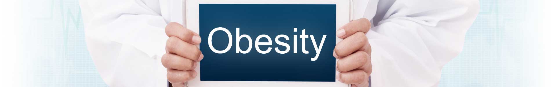 Healthcare professional in white coat with stethoscope around neck holding a blue sign with obesity written on it