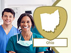 Young female nurse with face mask around her neck and young male nurse in blue scrubs, both smiling and Ohio state outline