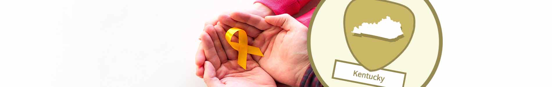 Two hands gently cupped around a yellow ribbon and Kentucky state image