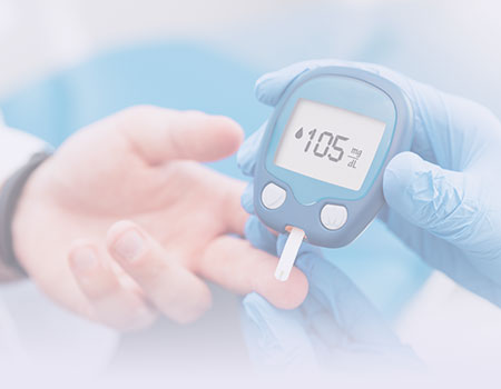 Hand with medical glove pricking finger with blood glucose meter showing number 105 representing endocrinology Nursing CEUs