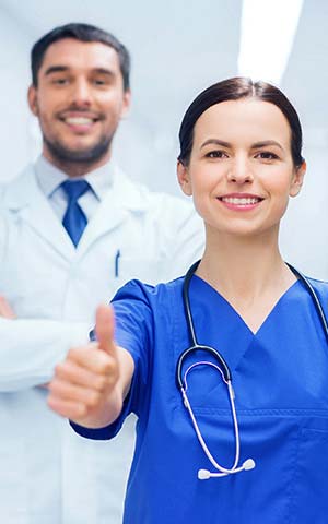 Nurse giving a big thumbs up